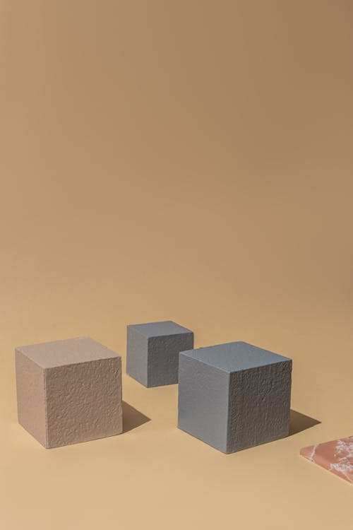 Cubes on a Beige Surface