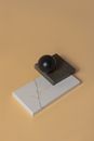 Black Round Ornament on White Box