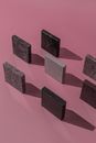 Pink and Black Blocks on Pink Surface