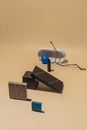 Black and Blue Corded Headphones on Brown Wooden Table