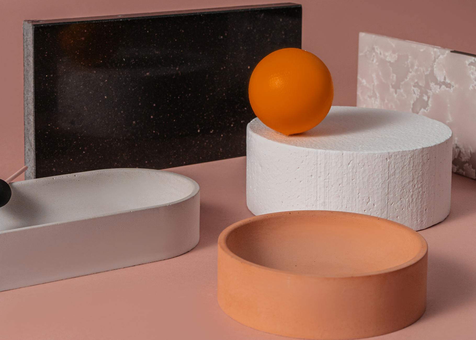 Trainers Hate This! 5 Fitness Machine Accessories That Give Instant Results 7 https://www.pexels.com/photo/orange-ball-lying-on-a-white-concrete-object-among-ceramic-containers-and-marble-boards-7828523/