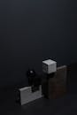 Wooden Cubes on a Dark Wall