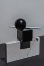 Black Round Fruit on White and Black Table