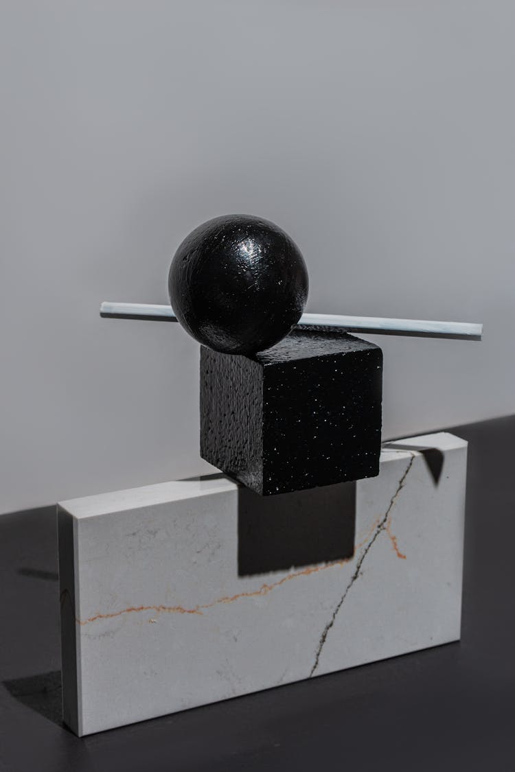 Geometric Shape Objects On A Gray Surface