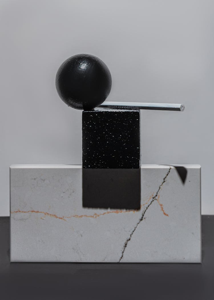 Geometric Shape Objects On A Gray Surface