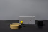 Yellow Ball on Black and White Box