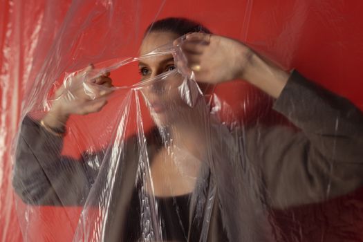 Woman Tear the Plastic to Go Out