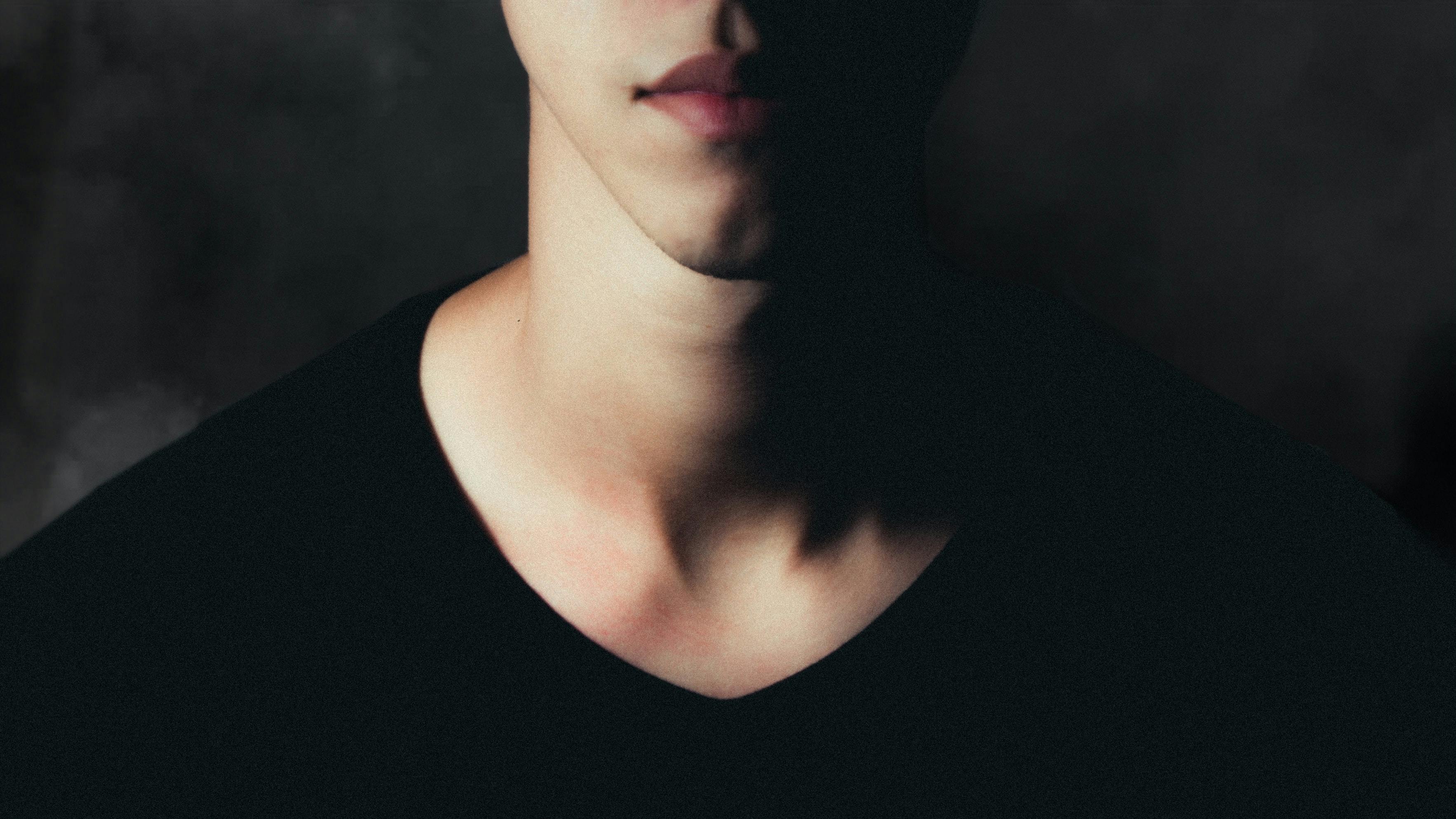 Close-up of Man Torso on Grey Background · Free Stock Photo