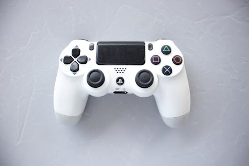 A Game Controller on a White Surface 