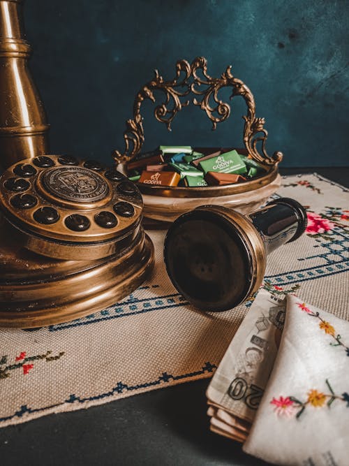 Free A Vintage Bronze Rotary Telephone Stock Photo