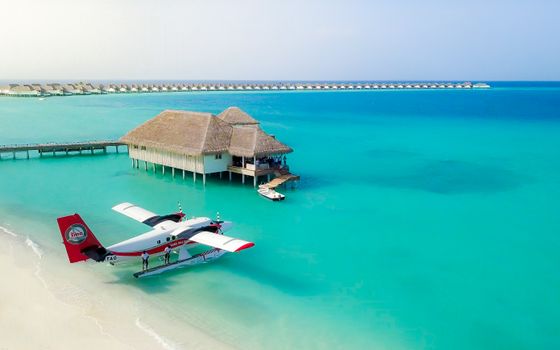 Seaplane transfer with atoll views — Maldives