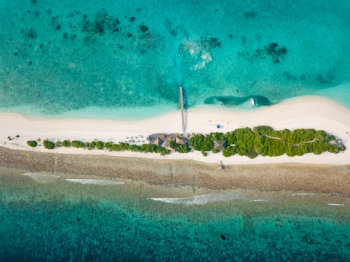 Foto profissional grátis de à beira-mar, aéreo, água