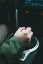 Close-Up Shot of a Person Holding a Gearshift Lever