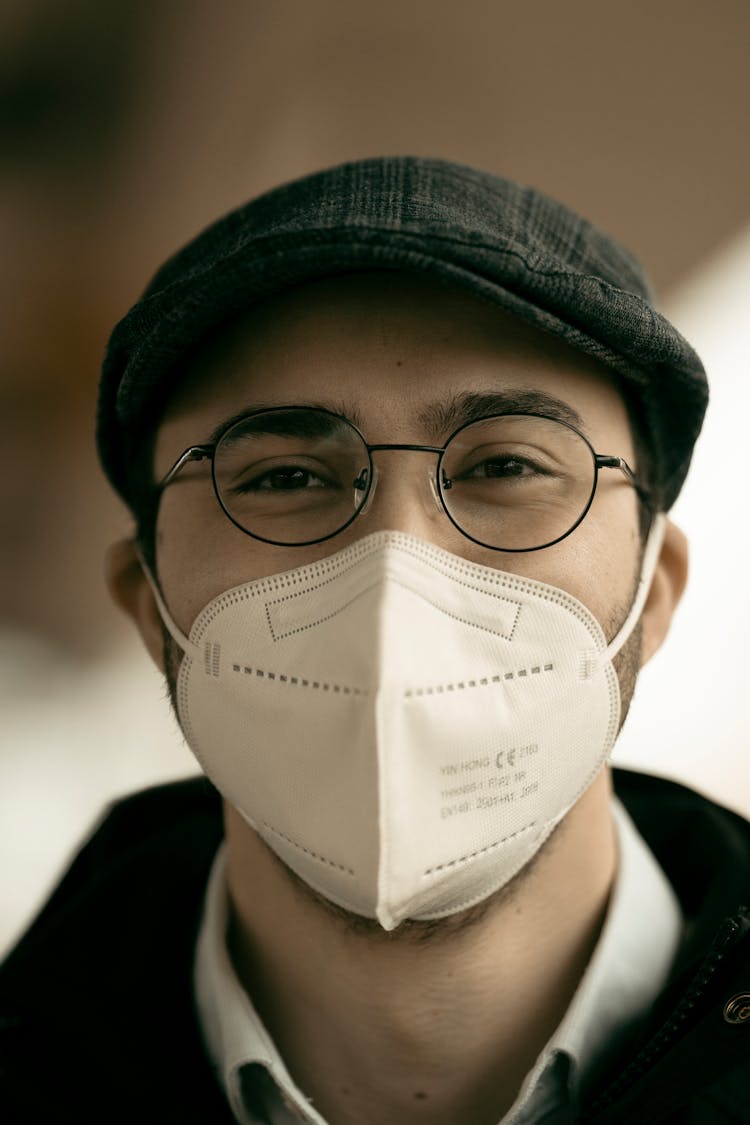 Man In Medical Mask And Eyeglasses