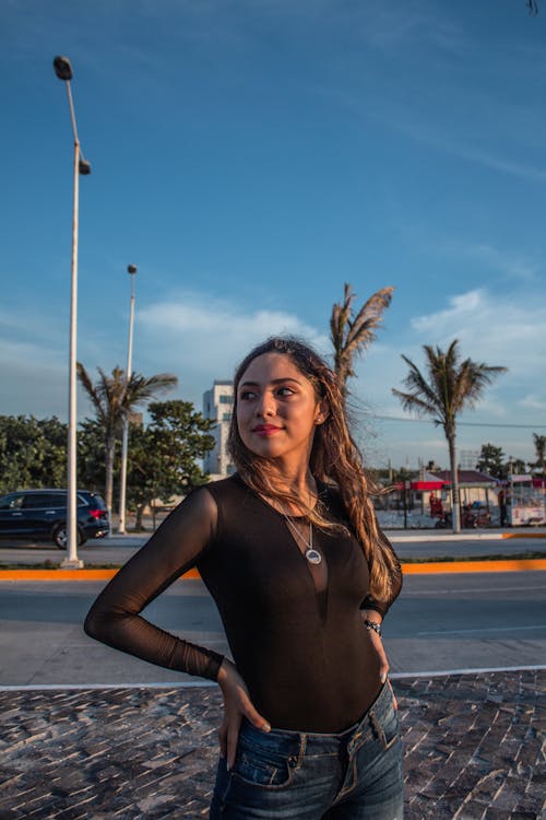 Portrait of a Woman Standing in the Street