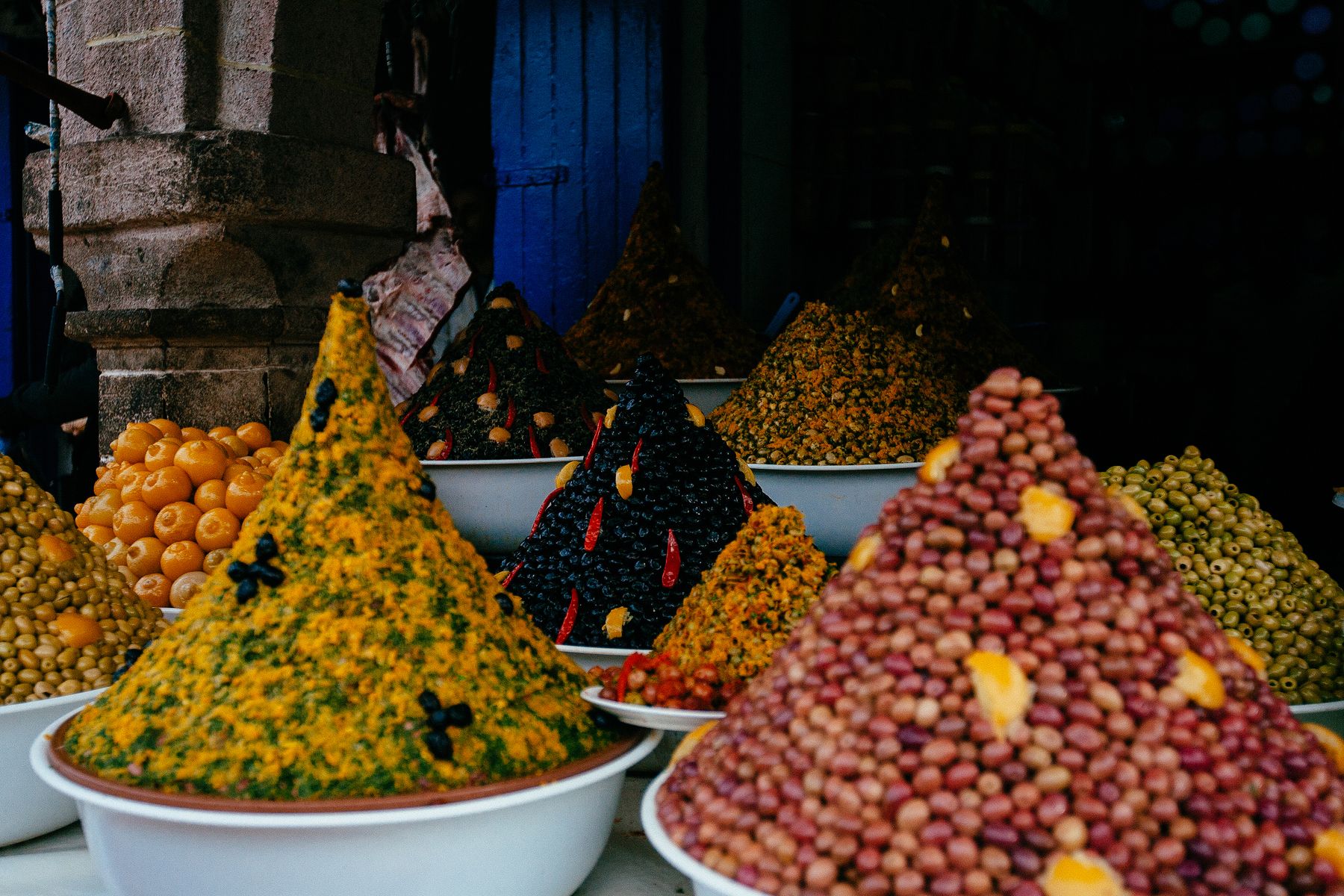 Colorful spices displayed in a traditional Moroccan market
