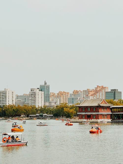 Motorboats on Lake in City