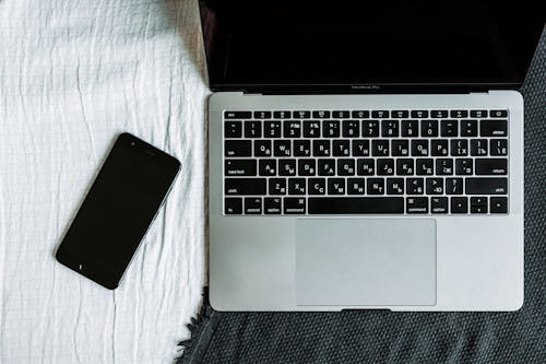 Free Laptop and a Cellphone Stock Photo