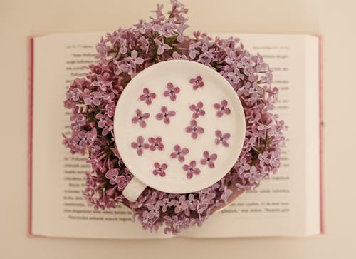 High Shot of Cup with Light Pink Flowers