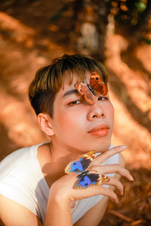 A Man With Butterfly on His Face