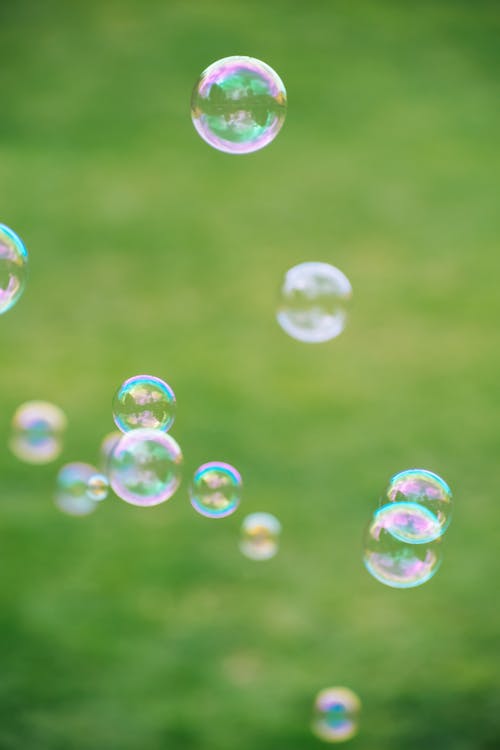 Selective Focus Photo of Bubbles Floating