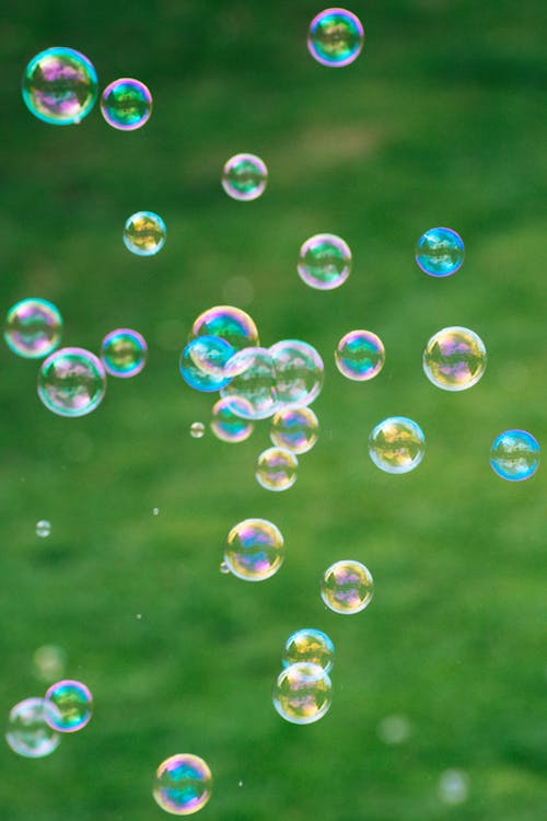 Close-Up Photo of Round Bubbles Floating 