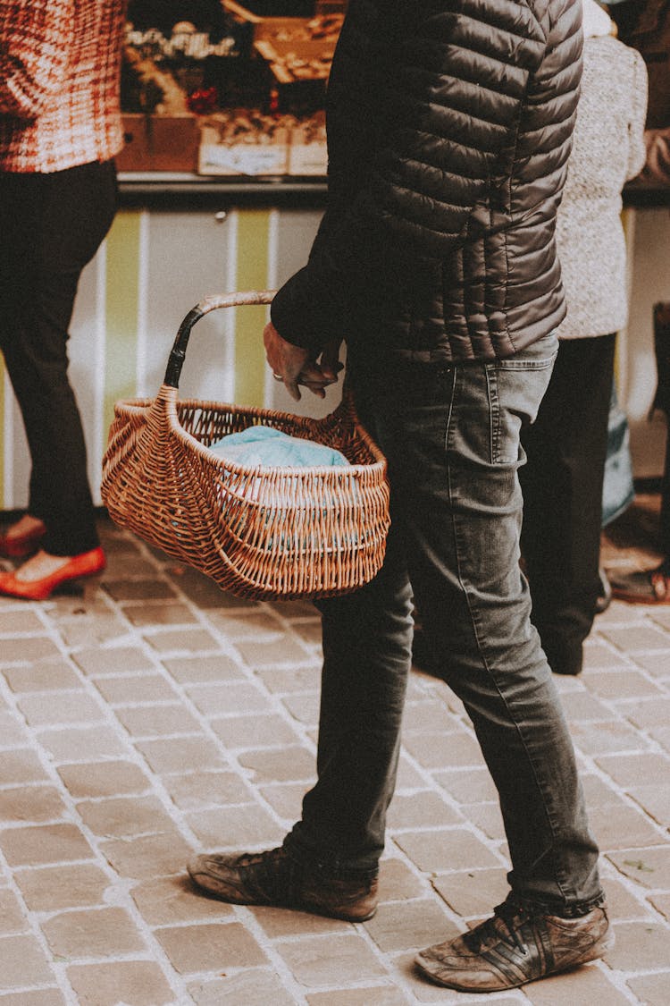 Crop Man With Basket On Street Market