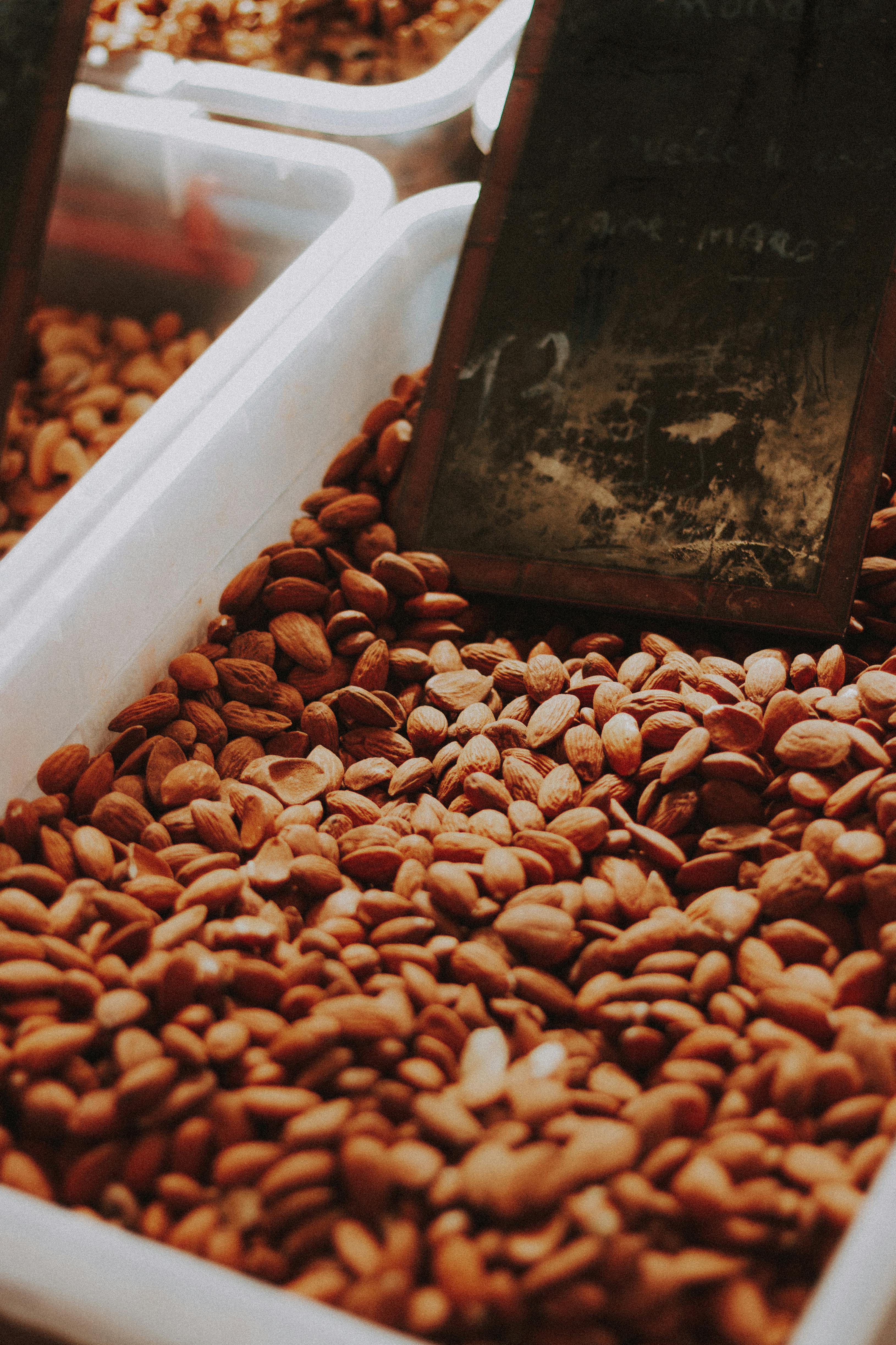 heap of almond in container