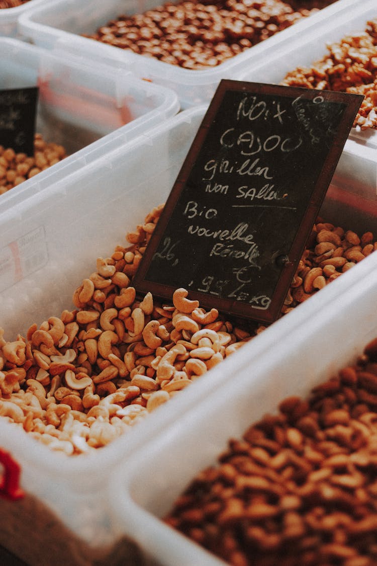 Cashew Nuts On A Plastic Container 