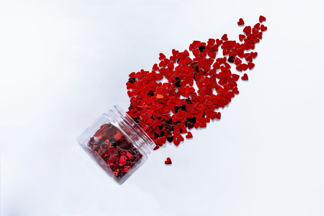 Heart Shaped Papers in Clear Glass Jar