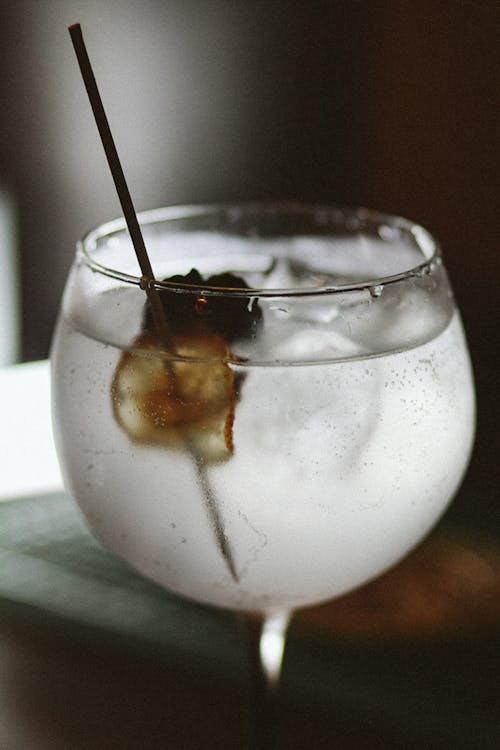 Selective Focus Photo of a Cocktail Drink with a Toothpick