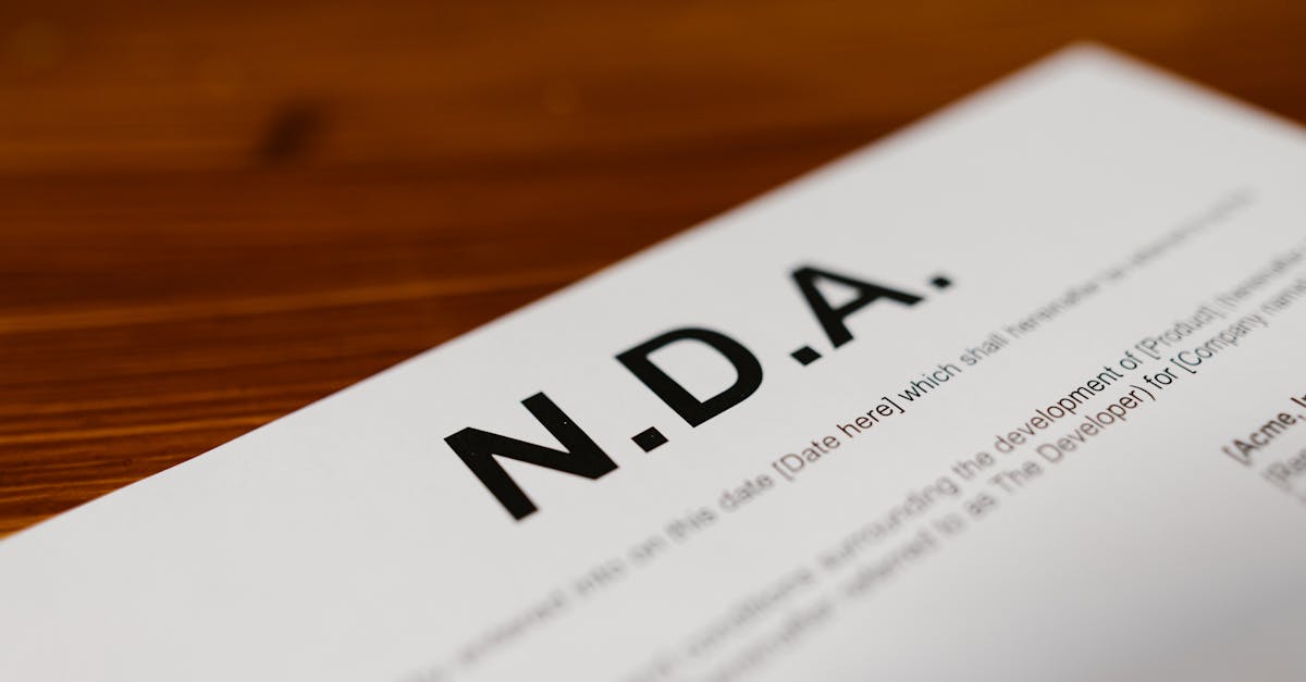 Photo by RDNE Stock project Focused close-up of an NDA document on a wooden desk, highlighting contract details.