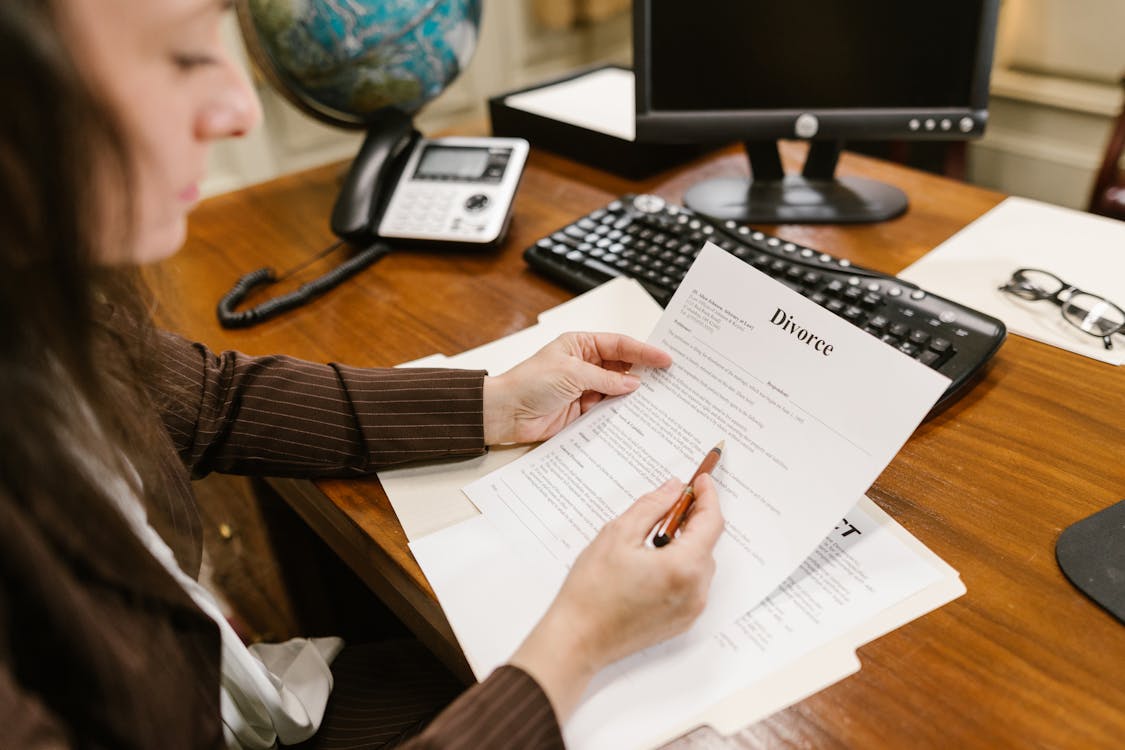 A person looking at divorce documents