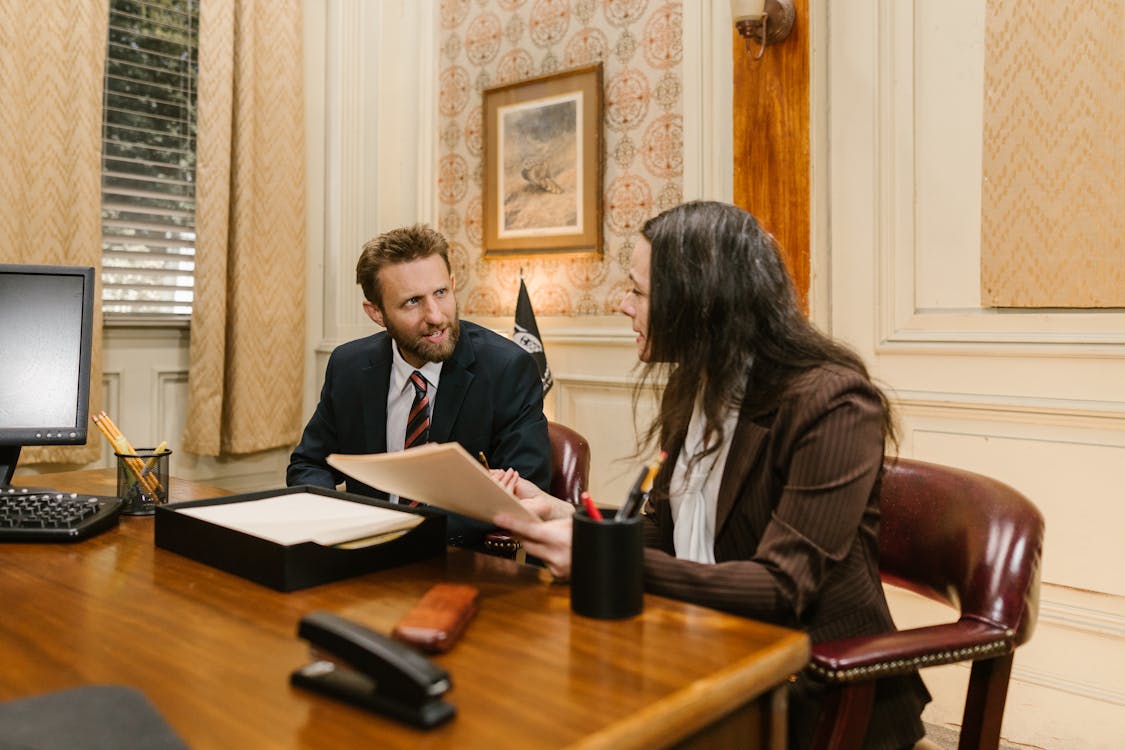 Lawyer and the client having a discussion 