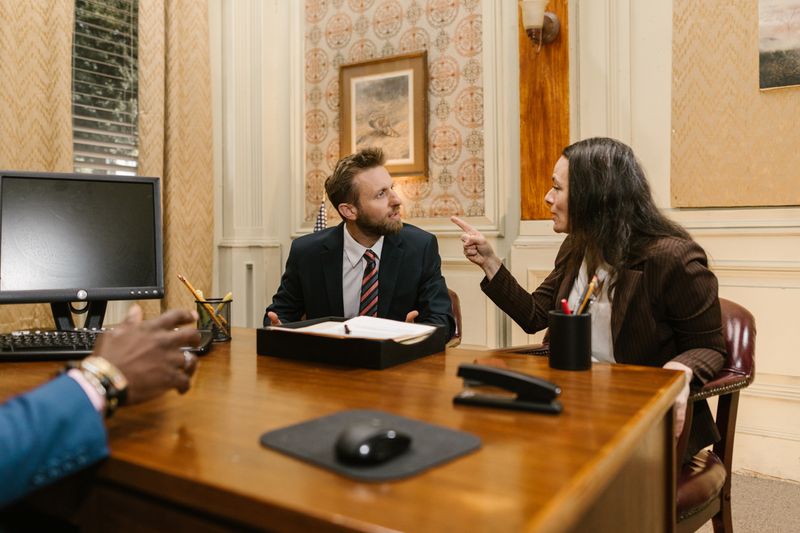 Professionals reviewing documents in an office
