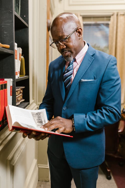 A Businessman Reading a Book