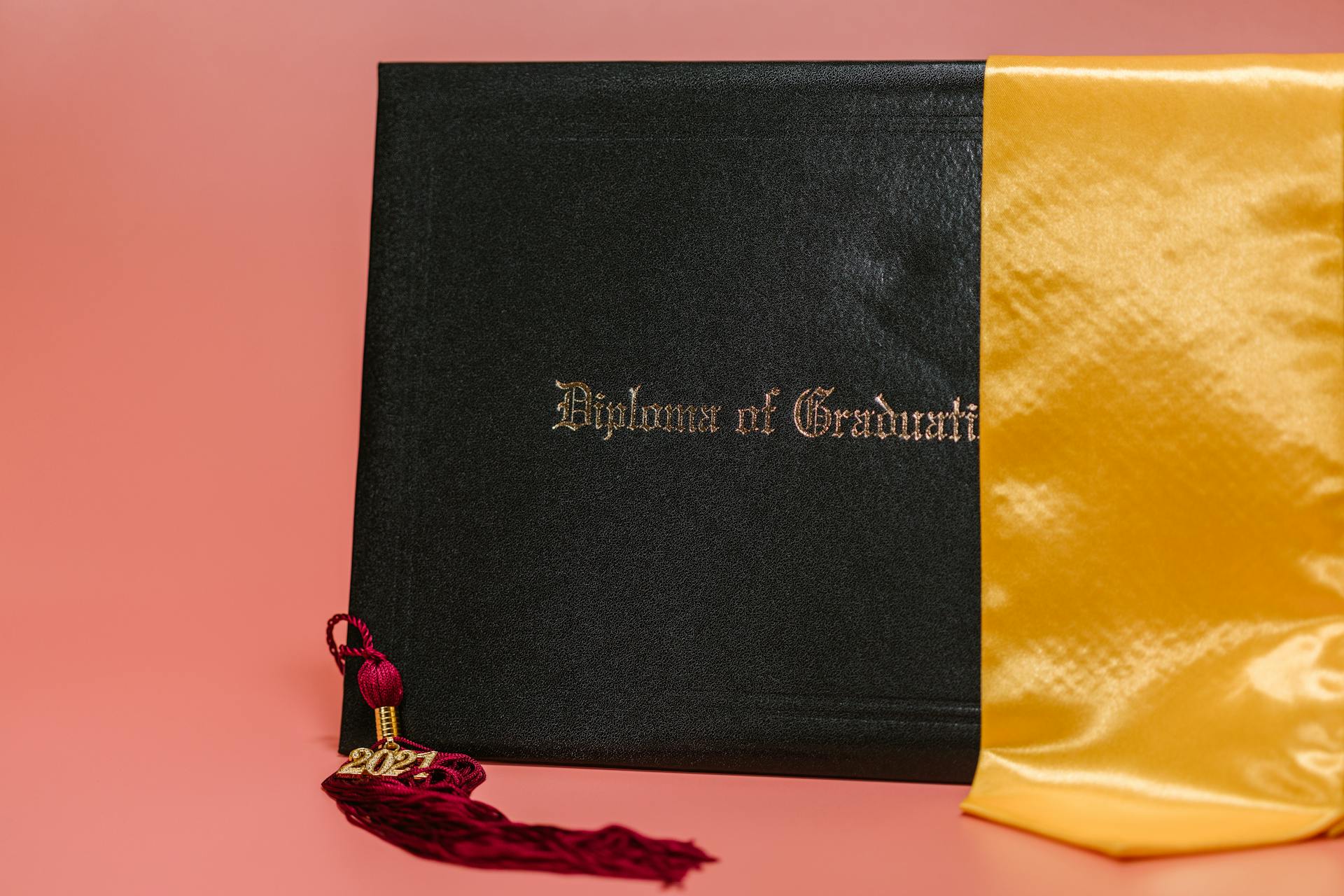 Close Up Photo of Diploma