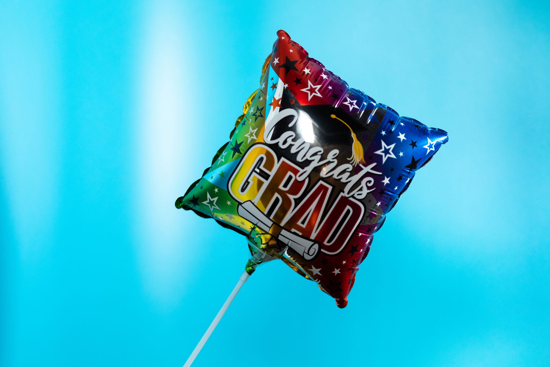 Graduation celebration balloon with congratulatory graduate message