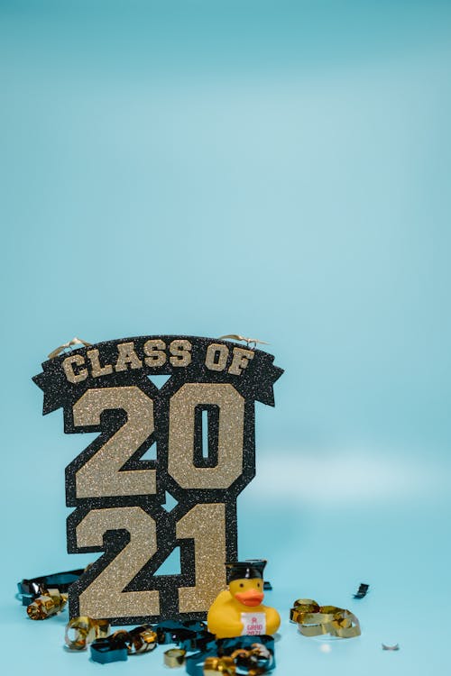 Graduation Decoration Saying "Class of 2021" on Blue Background 