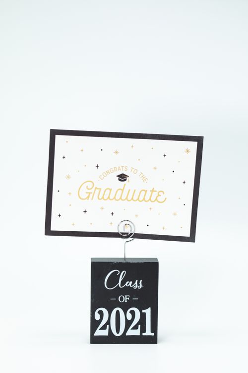 Free Minimalist graduation card with 'Congrats to the Graduate' and 'Class of 2021'. Stock Photo