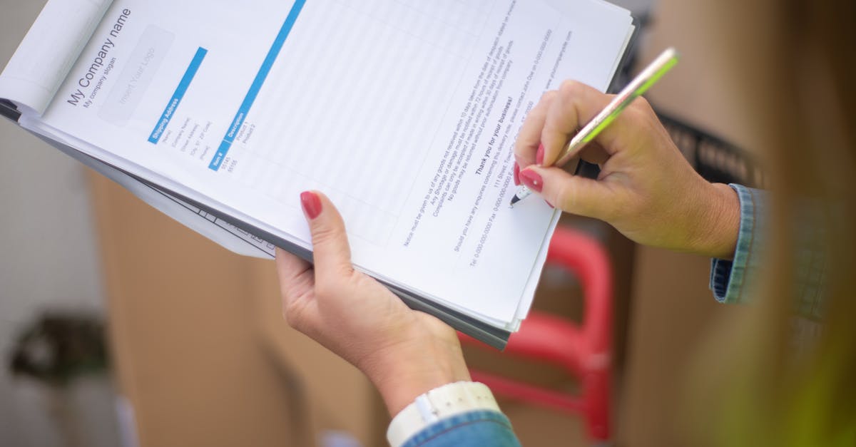 The bail bondsman explaining the bail process to a client in an office.