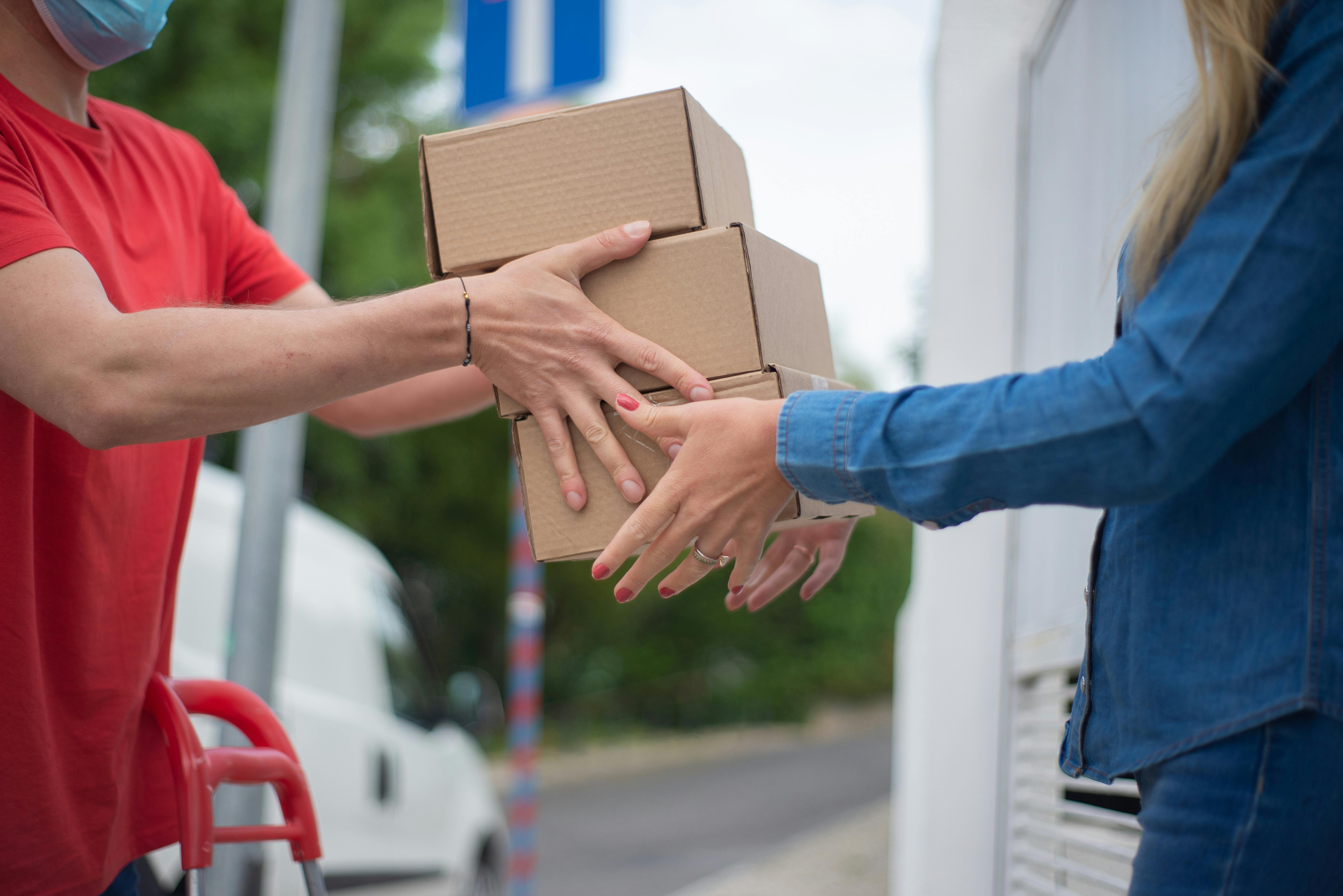 a person receiving a boxes