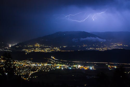 Flashes of Thunder in the Sky During Night Time