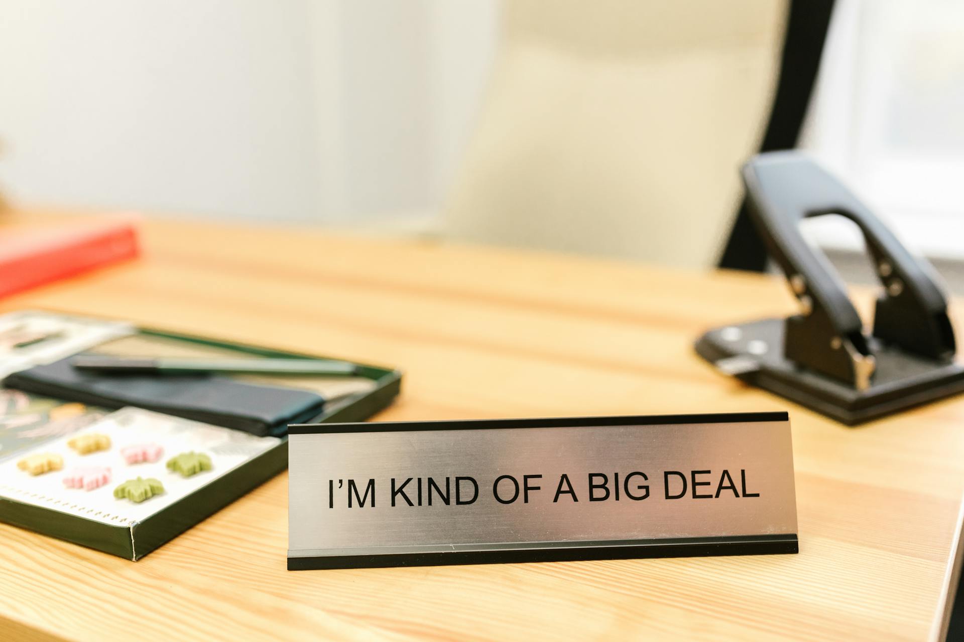 Name Plate on a Desk with a Humorous Message