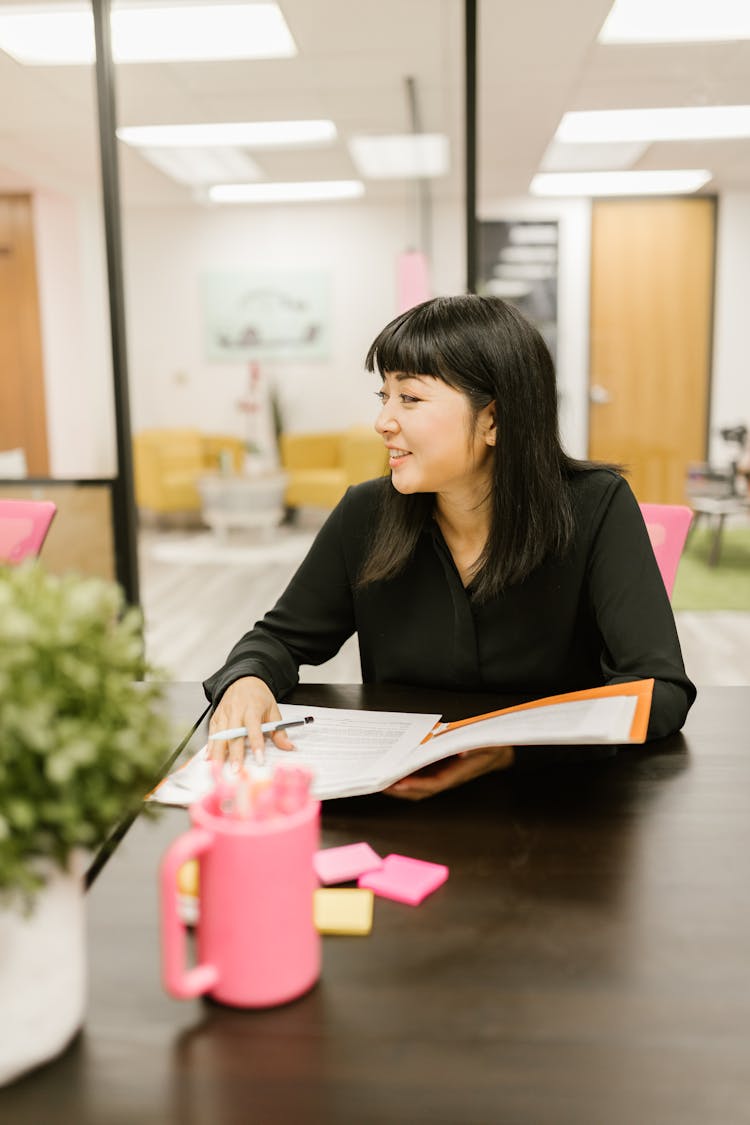 Smiling Businesswoman At A Corporate Meeting