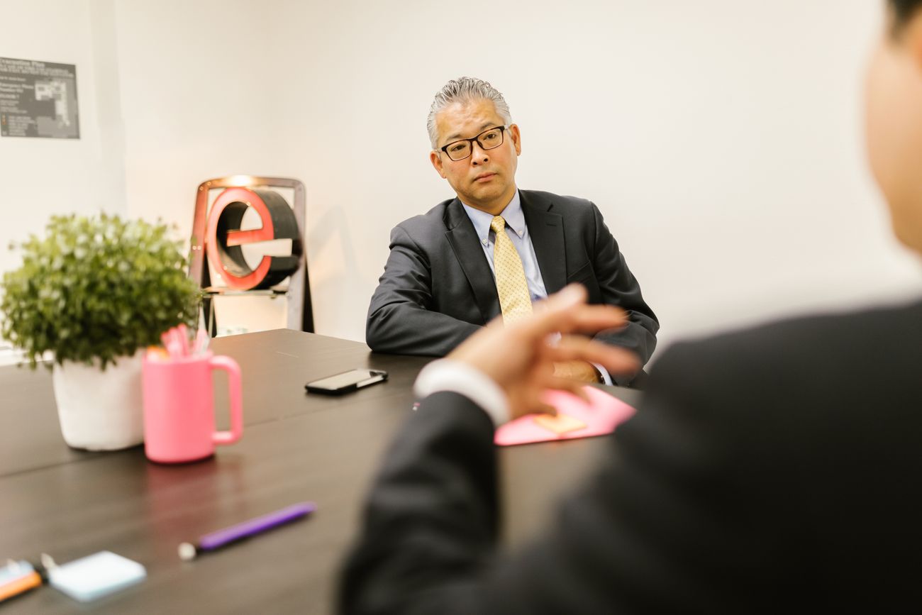 Two professionals having a one to one project discussion