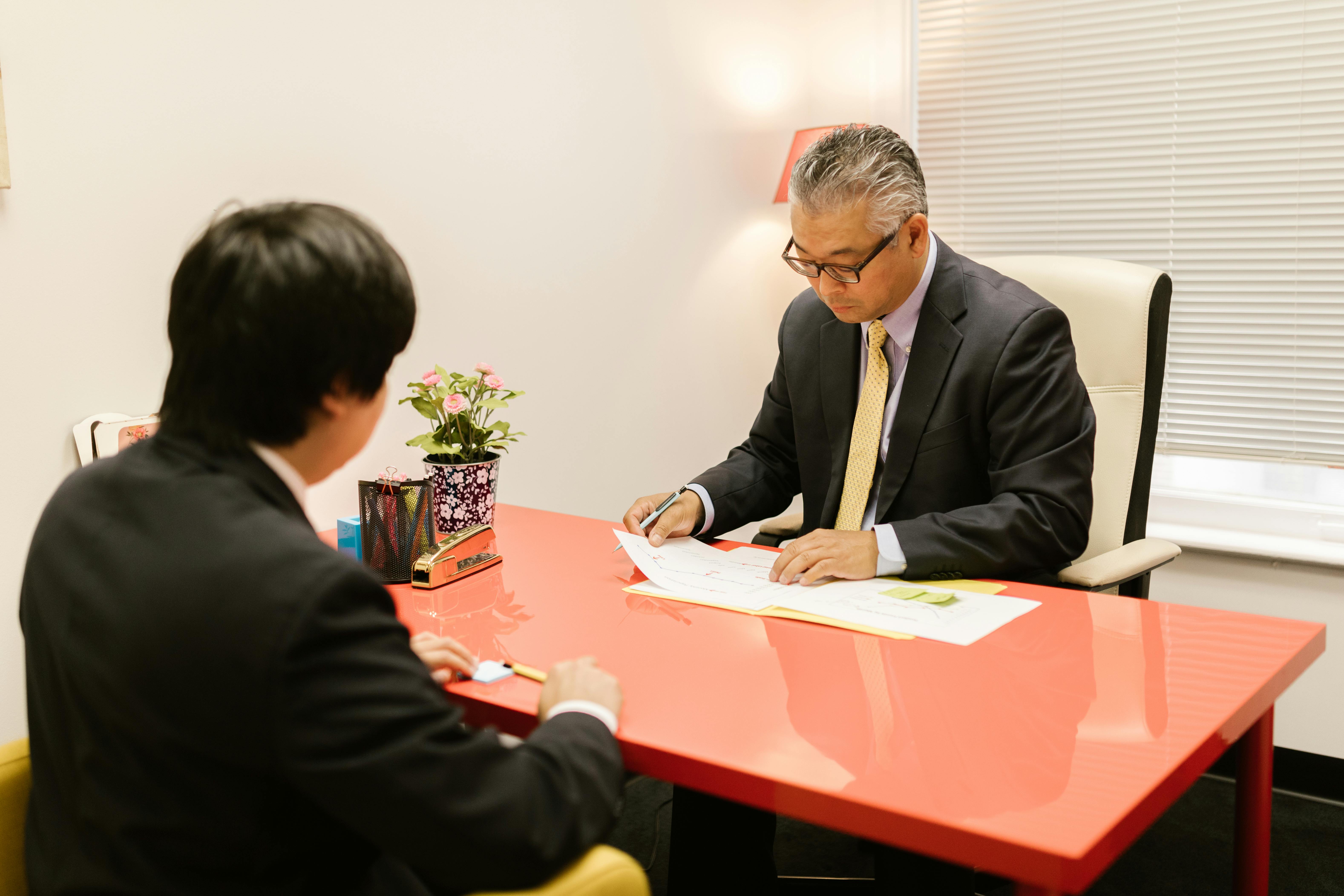 two people having a meeting in the office