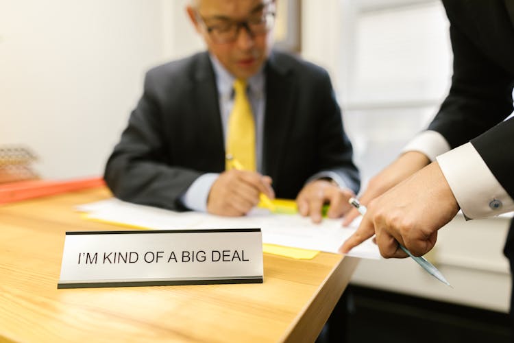 Close-up Of A Nameplate On A Table