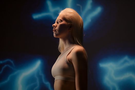 Side profile of a woman with glowing artistic background, creative studio lighting.
