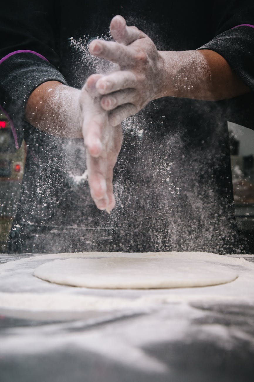 a person making dough for buttermilk biscuits